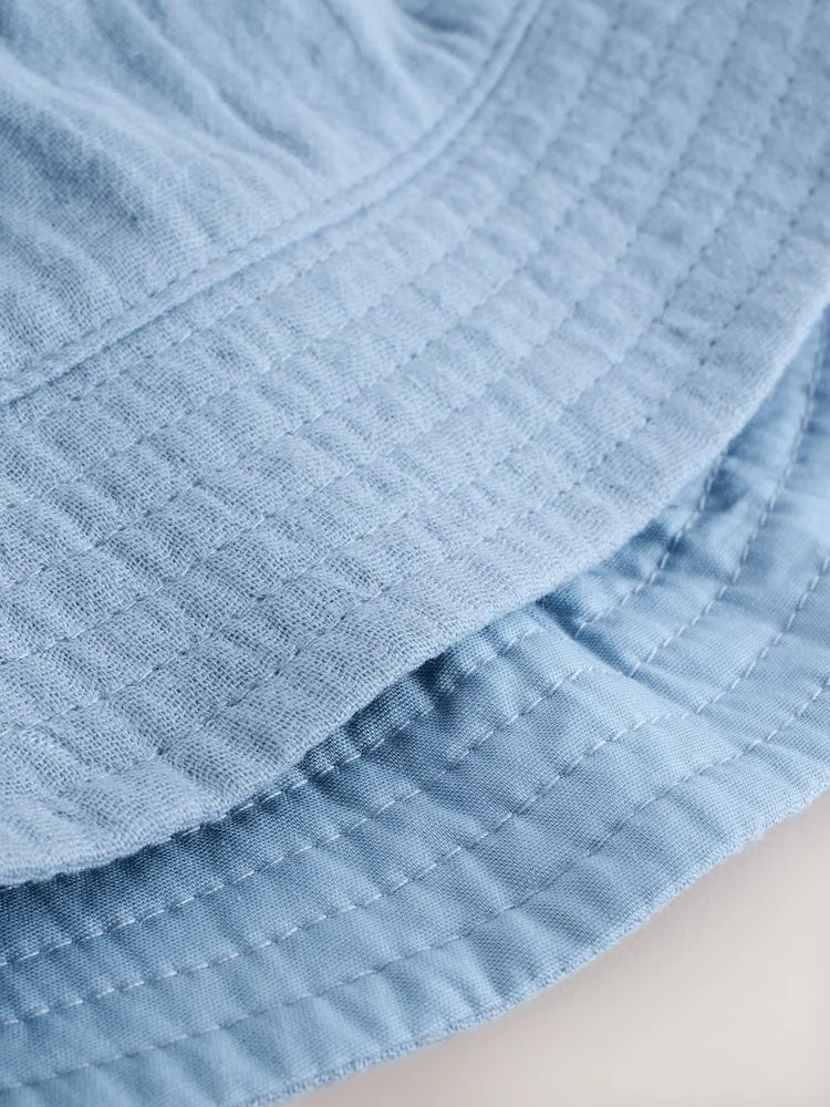 Blue and beige bucket hats for babies, 2-pack