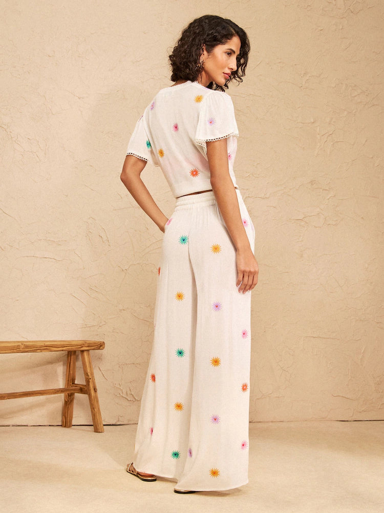 Ivory with sun embroidery - Love & Roses wide-leg beach trousers