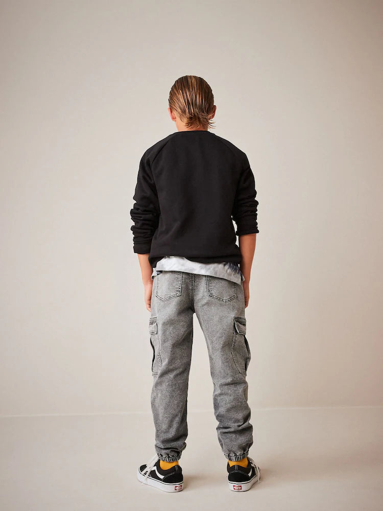 Grey jeans with cargo pockets and elastic waistband (3 to 16 years)