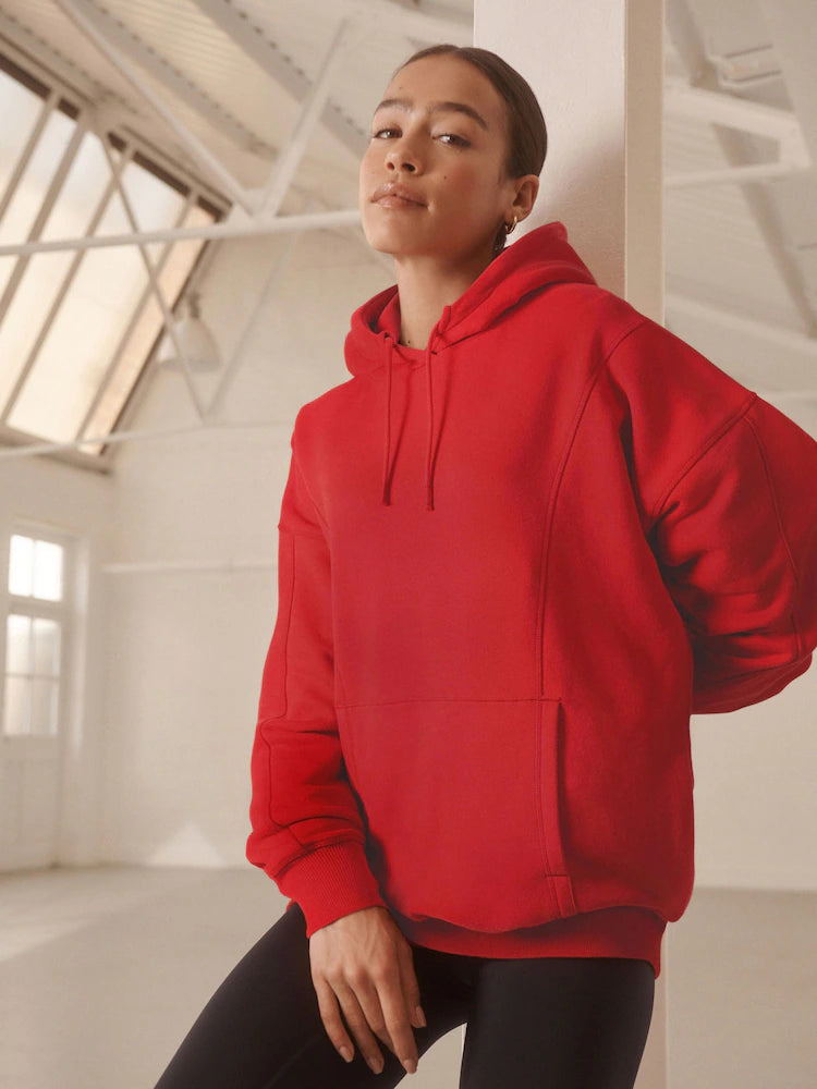 Cherry red - Long-cut hooded sweatshirt in a relaxed fit