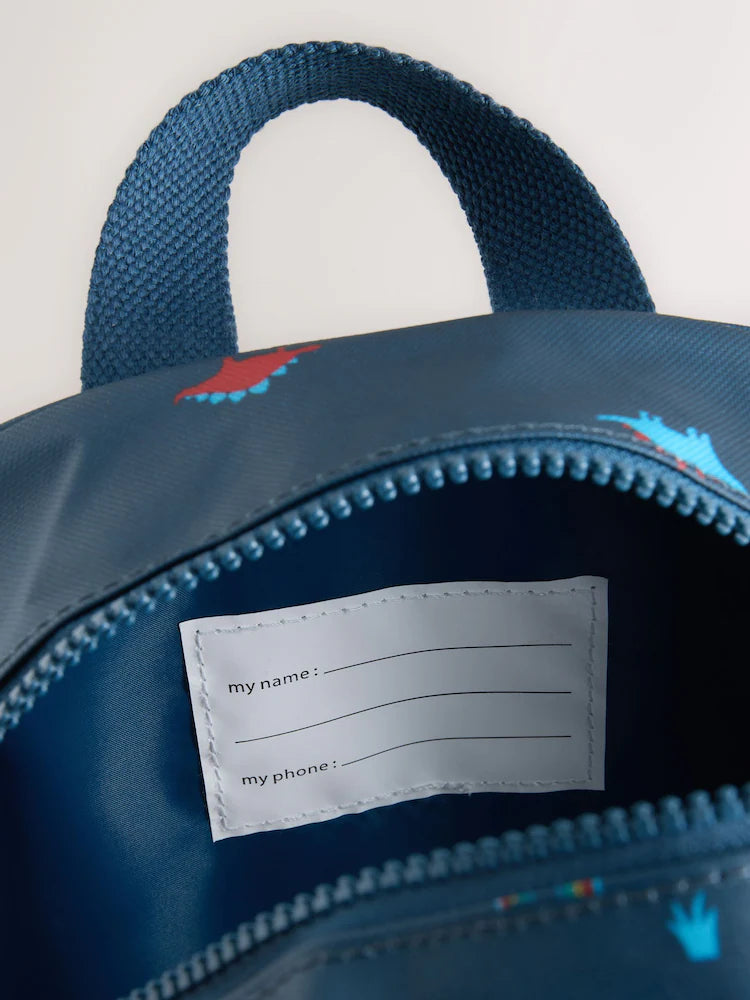 Navy blue dinosaurs with all-over print - backpacks