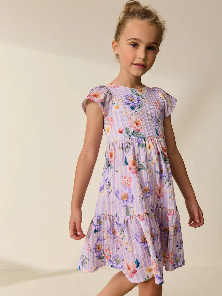 Lilac floral print crinkle dress with flutter sleeves (3-16 years)