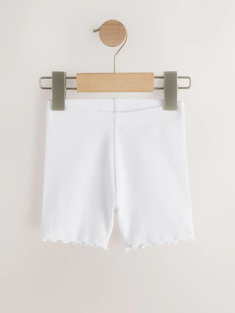 Rainbow-colored cycling shorts in a 5-pack
