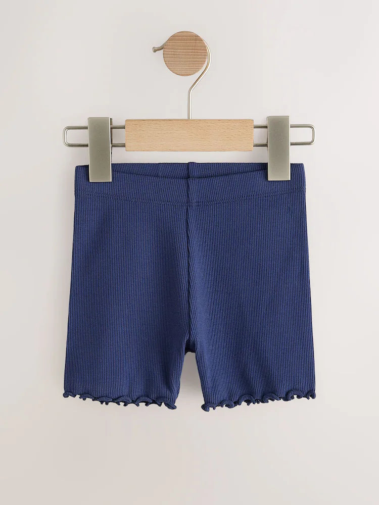 Rainbow-colored cycling shorts in a 5-pack