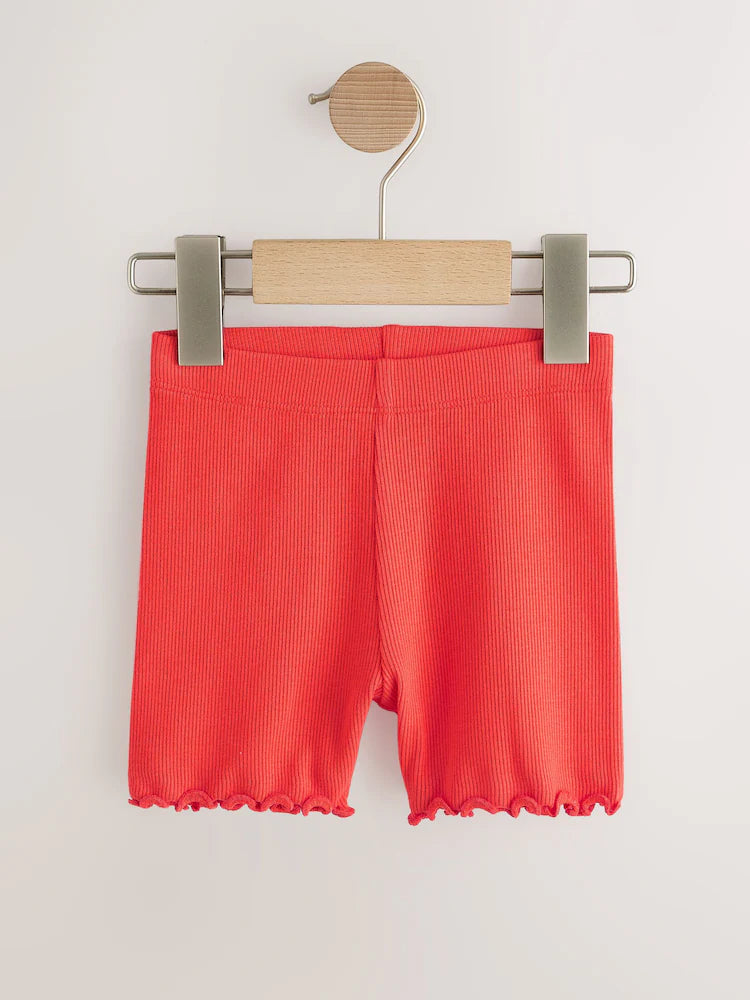 Rainbow-colored cycling shorts in a 5-pack
