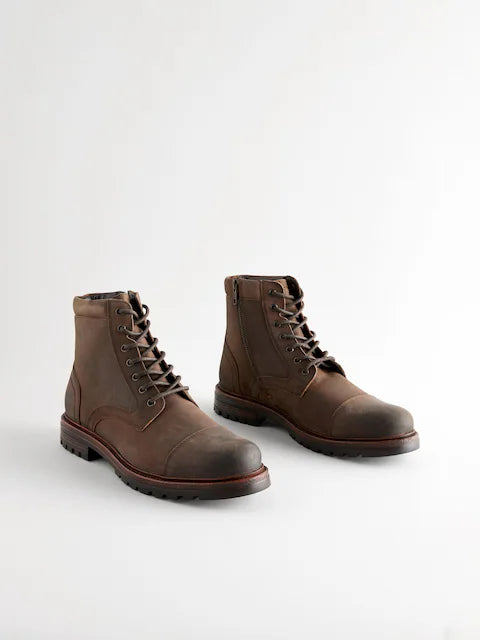 Brown leather boots with toe cap and zipper