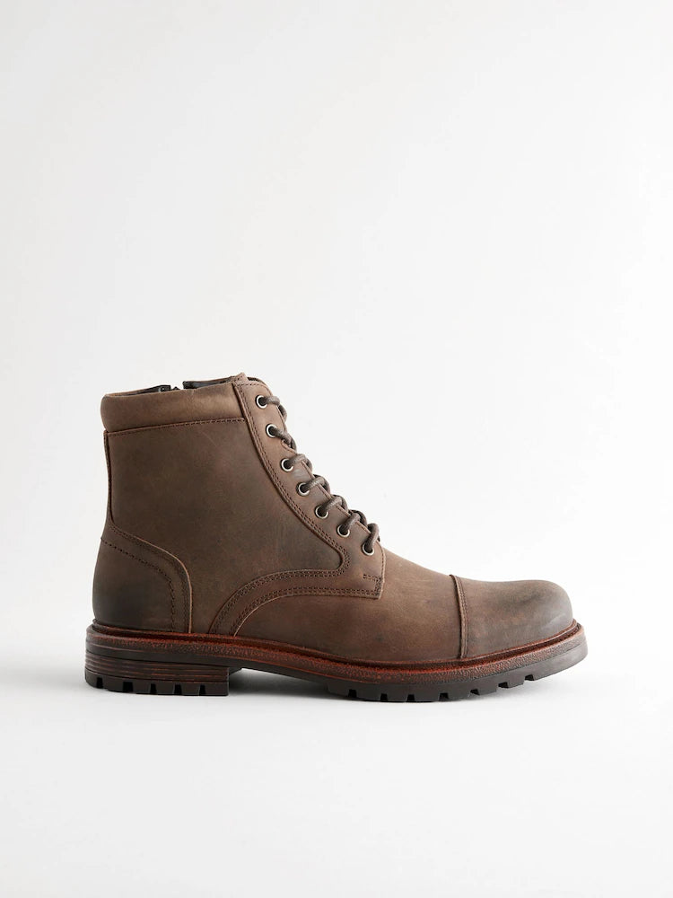 Brown leather boots with toe cap and zipper