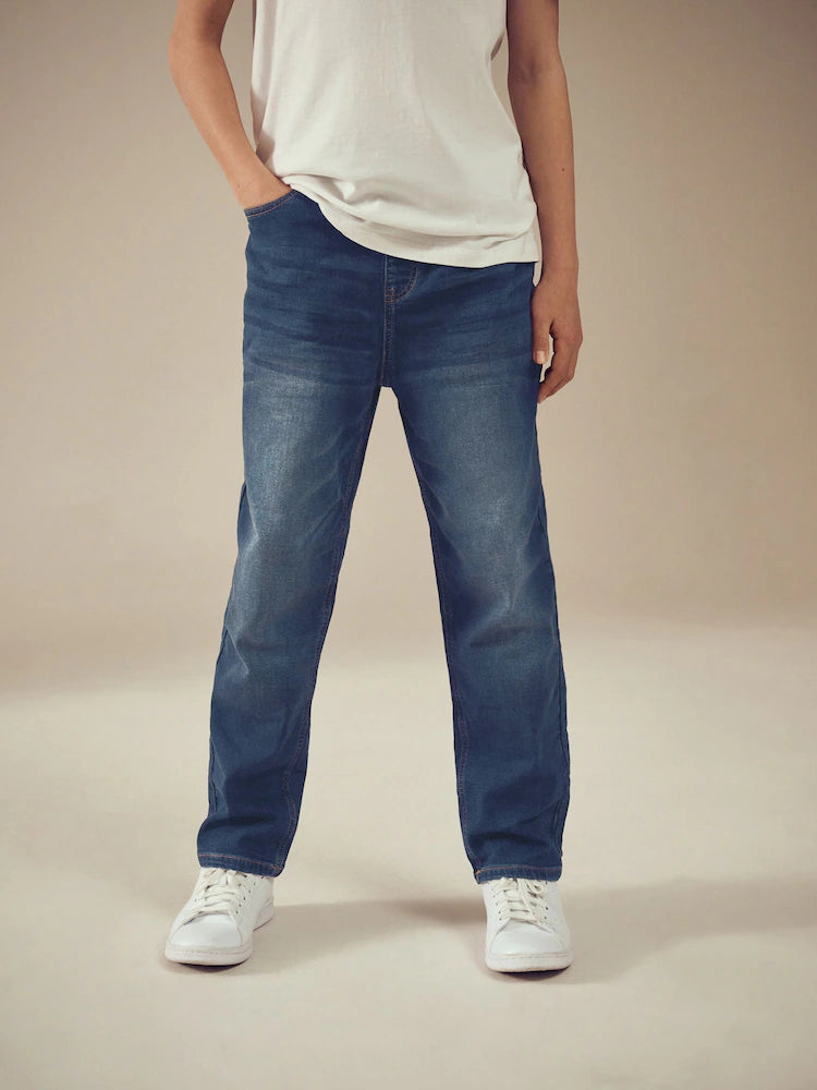 Indigo blue stretch jeans with elastic waistband (3-16 years)