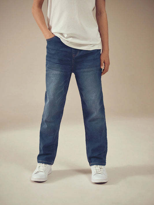Indigo blue stretch jeans with elastic waistband (3-16 years)