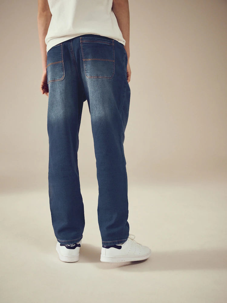 Indigo blue stretch jeans with elastic waistband (3-16 years)