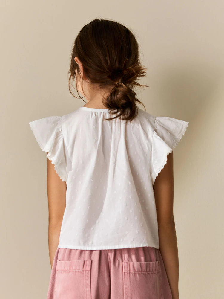 White blouse with lacing at the front