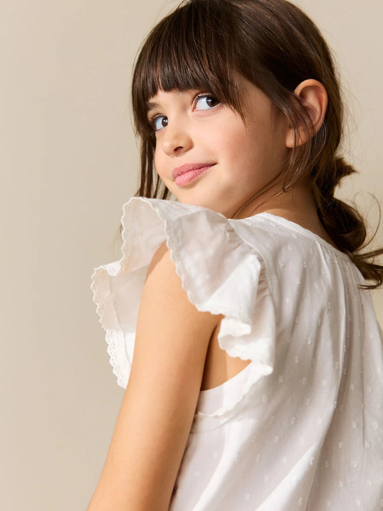 White blouse with lacing at the front