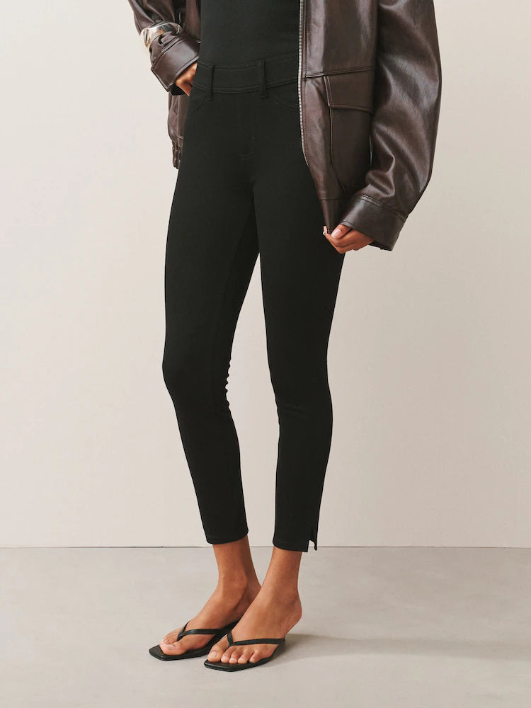 Black denim jersey leggings with a cropped fit
