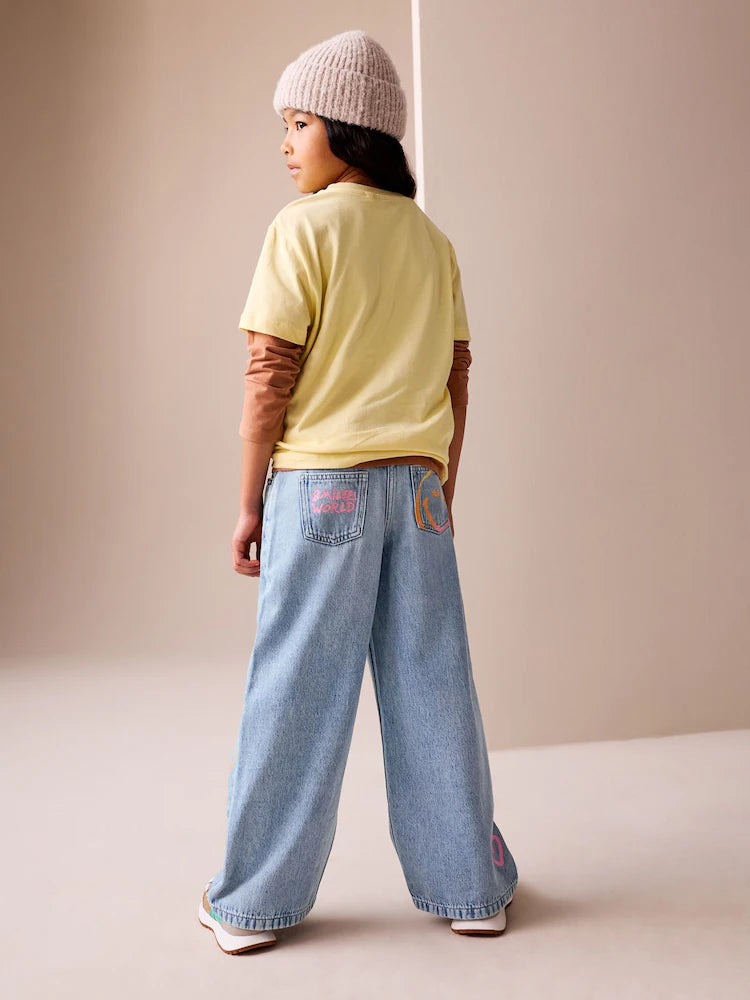Medium blue - wide-leg jeans with SmileyWorld® print (3-16 years)