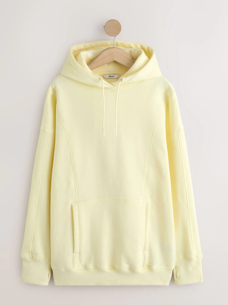 Buttermilk yellow - Long-cut hooded sweatshirt in a relaxed fit